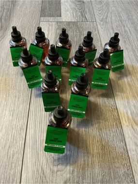 12 Wallflowers refill bottles - green labels, Iced Ginger snap bath & body works